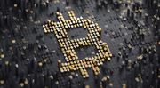 Bitcoin je nad 10 000 dolary, rostou i další kryptoměny