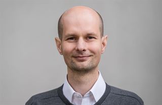 Výhoda vlastní měny je iluze, říká Baxa ze Zelených